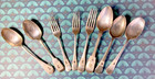 Ssilver-plated spoons and forks, vintage or antique