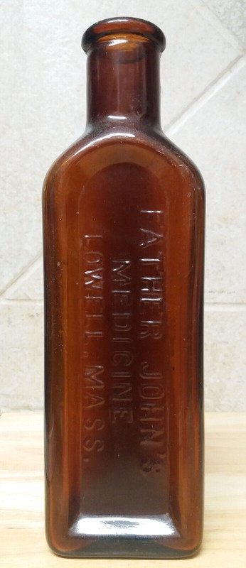 Father John's Embossed Medicine Bottle Brown Glass Early 1900s USA Lowell