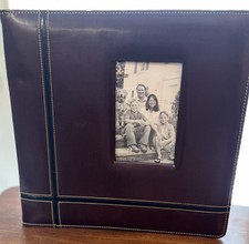 2 Scrapbooks Plus 12 Page Protectors And 24 Extra White Pages.