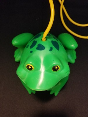 squeeze bulb jumping frog toy