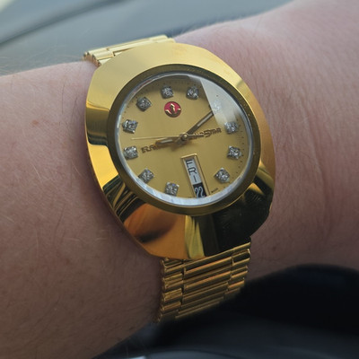 2026 Rado DiaStar Gold Tone Day/Date Diamond Markers Bracelet Box Papers