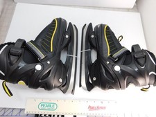 Xiuwoug Adjustable Ice Skates size L Childs 38-41, unused, black yellow