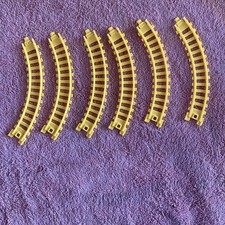 6 Pieces Of Toy Train Tracks. Unknown MFG. 5  L