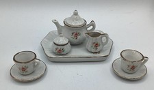 10 Piece Ceramic Dolls Tea Set with Floral Motif Gold Trim
