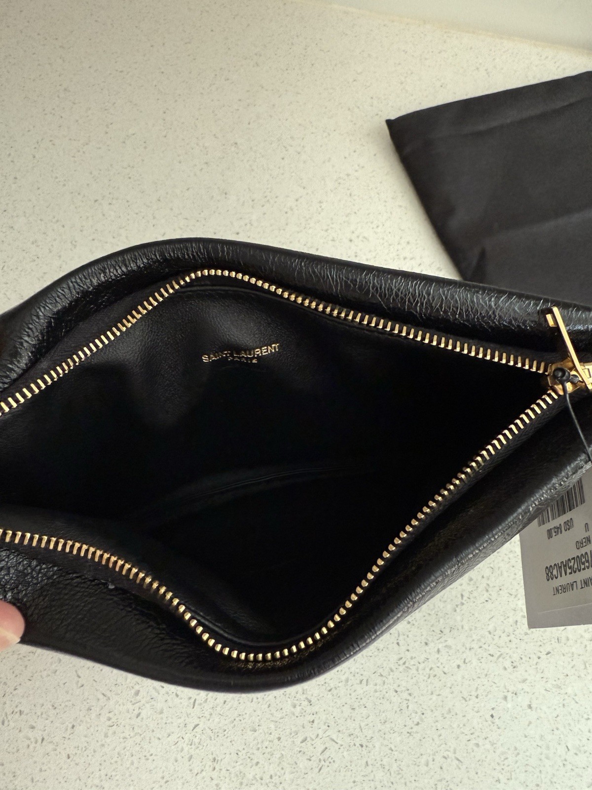 Pochette Saint Laurent Calypso Small YSL in pelle liscia imbottita $950