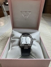 GUESS rectangular  watch with a crystal-accented bezel and leather strap Used