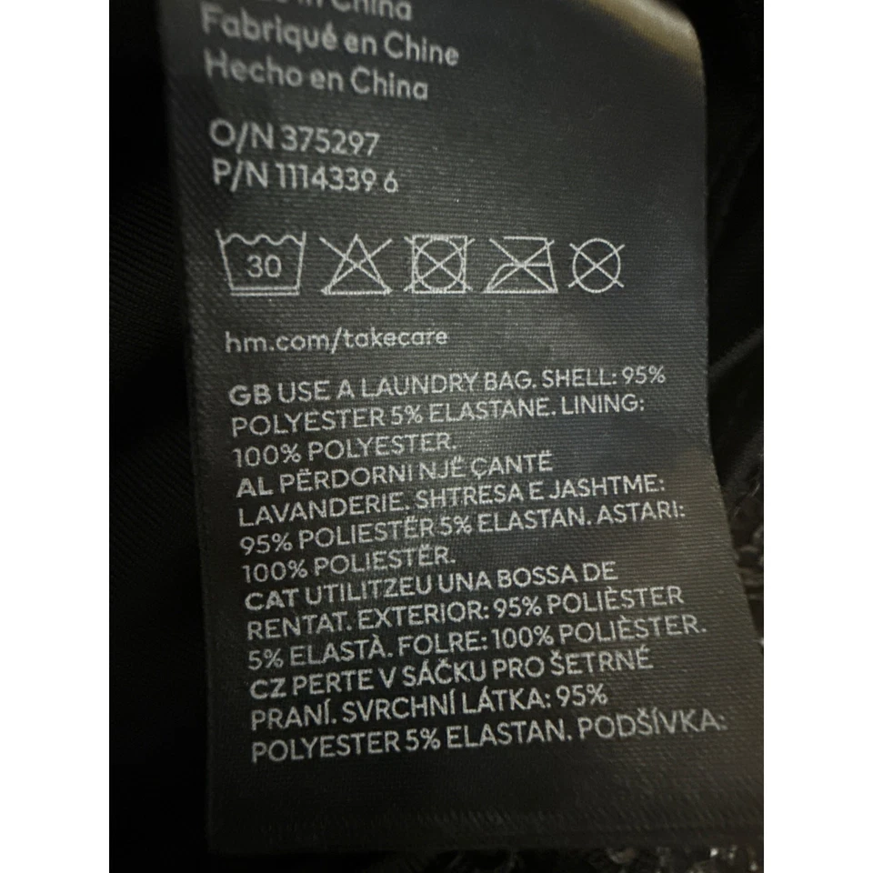 Blusa corta manga corta cuello redondo adornada con lentejuelas negras talla L de H&M para mujer Foto 4 de 4