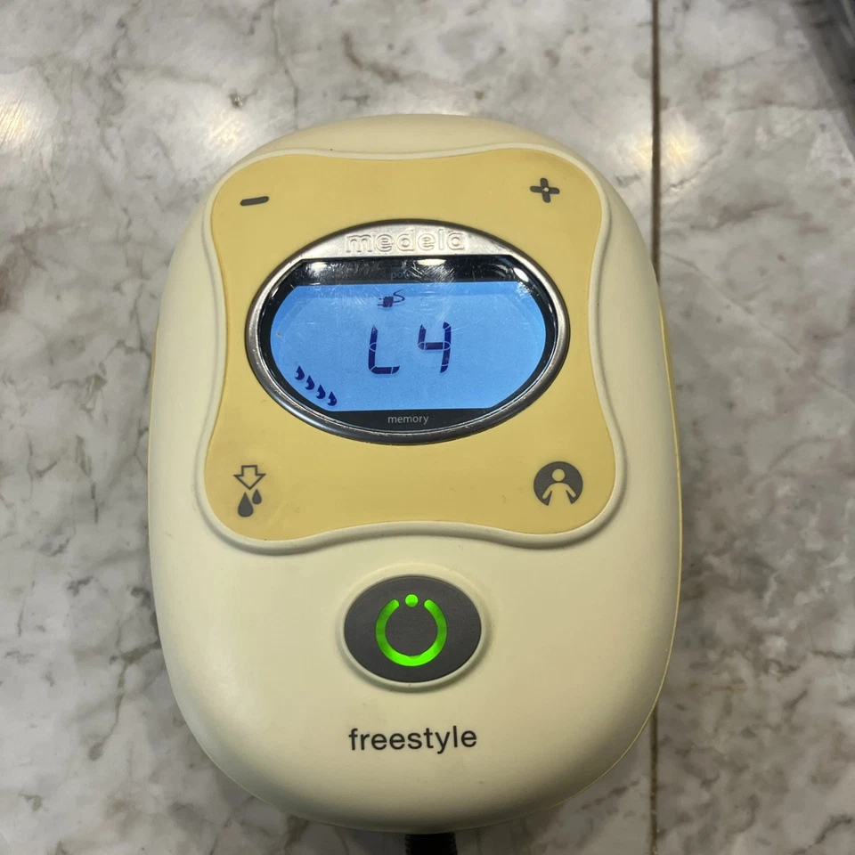 Extractor de leche Medela Freestyle solo con cable de alimentación Foto 2 de 3