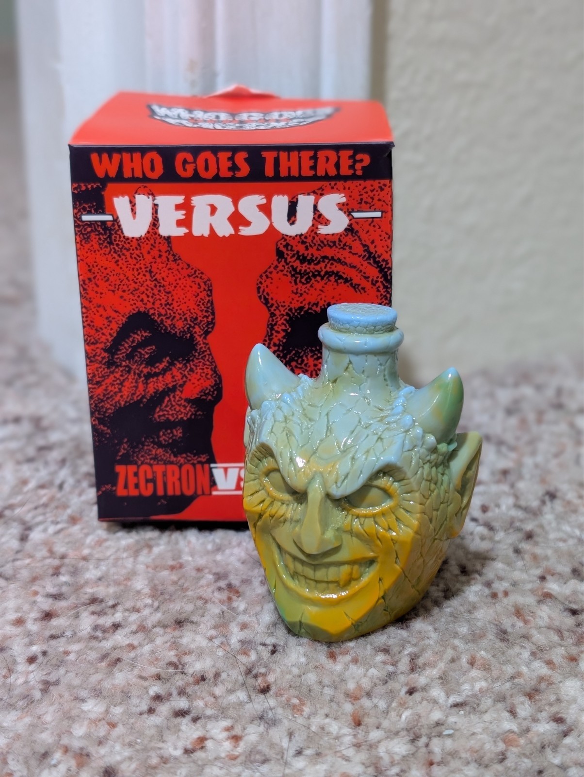 Unbox Industries Who Goes There? Retroband VS Zectron Maba bottle demon
