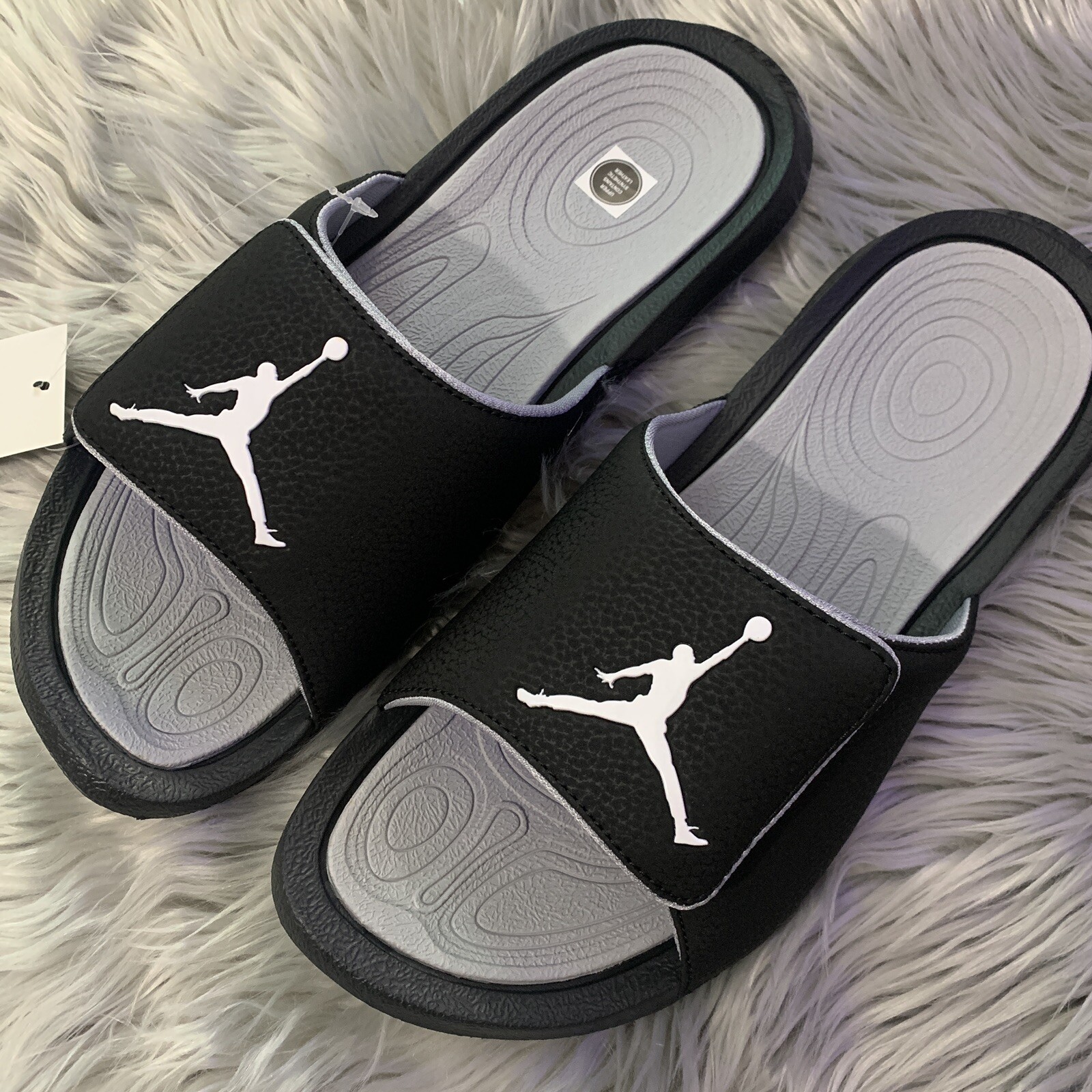 gray jordan slides