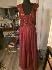 Red sequin maxi dress with open back