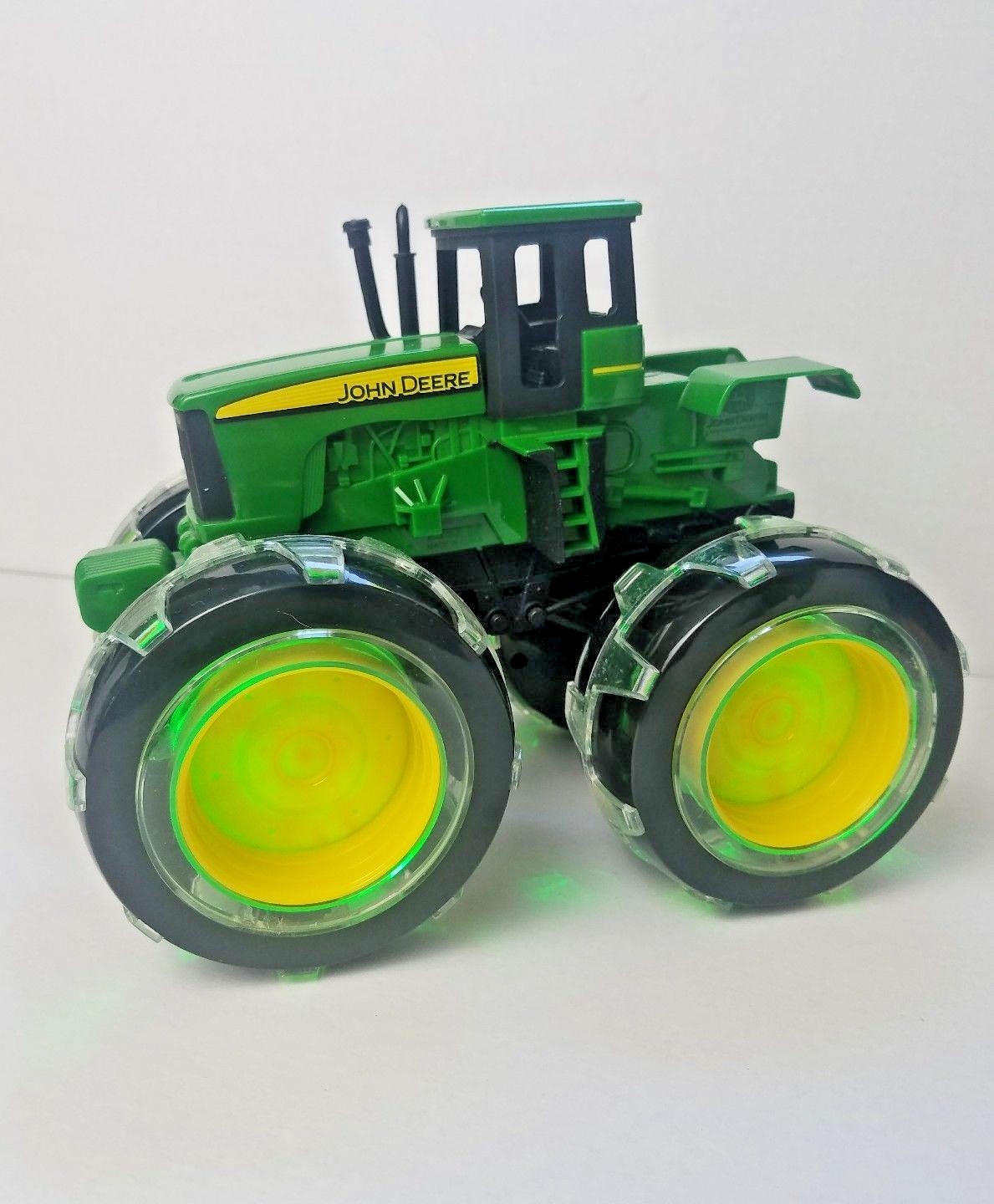 ertl john deere tractor with lightning wheels