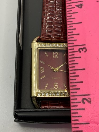 Montre femme bracelet Avon Kayla, lunette ton or strass transparents (neuve) - Photo 5/5