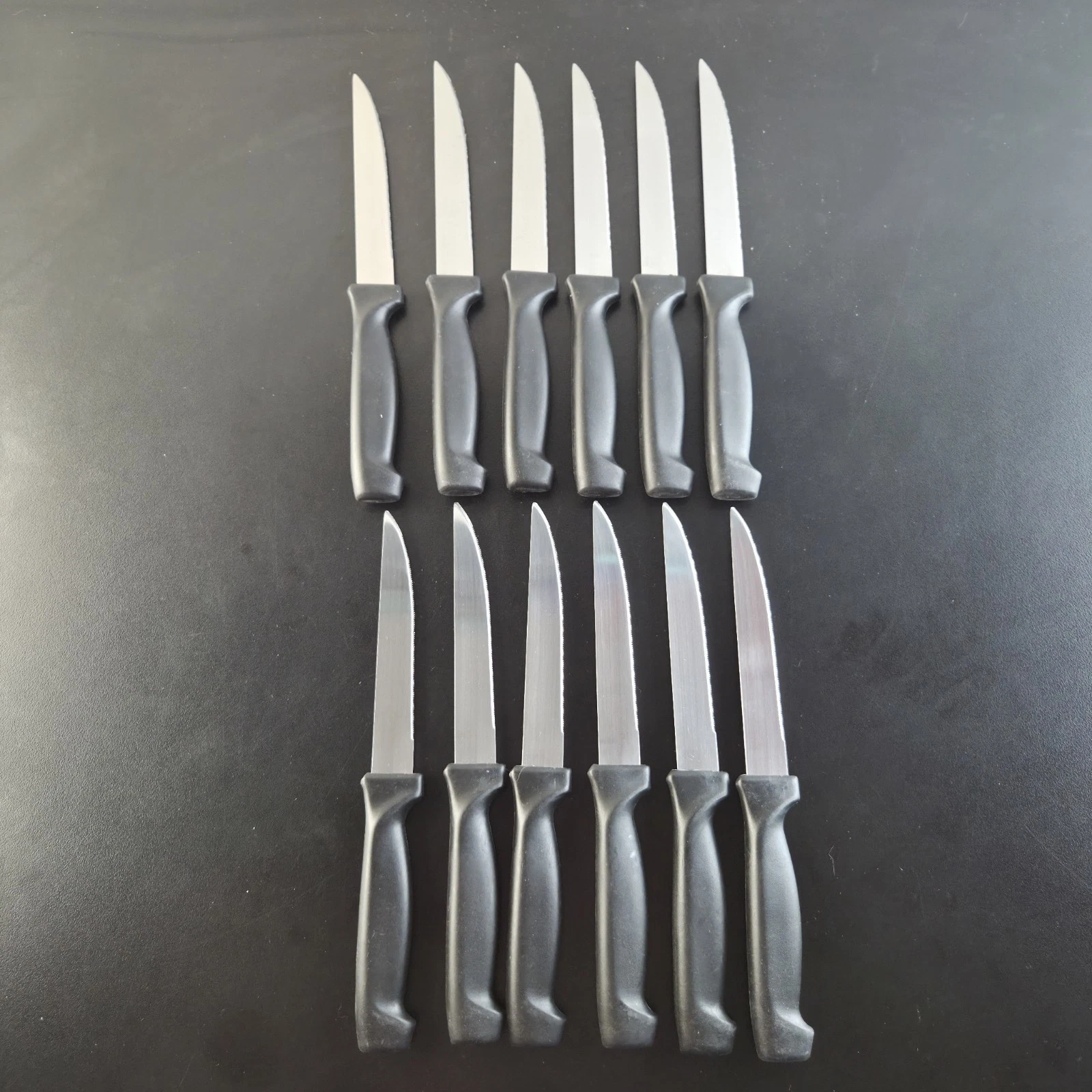 Lot Of 12 Black Plastic Handle Serrated Kitchen Knives Unbranded NEW!
Opens in a new window or tab