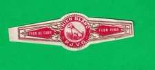 Cigar band of White Dog, made for tobacco factory la "Flor de Cuba"