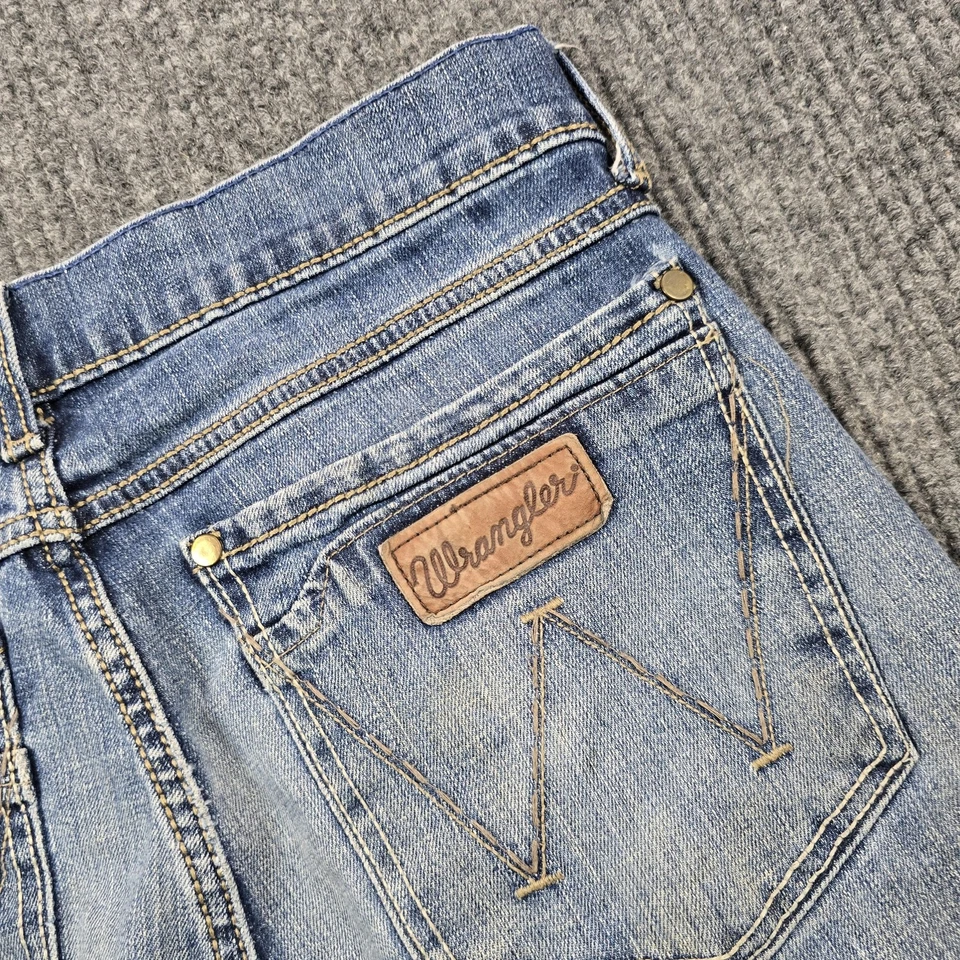 Pantalones de mezclilla Wrangler retro ajustados para hombre 30x34 azul elástico corte bootcut occidental Foto 4 de 4