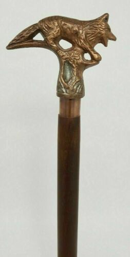 Bâton de marche en canne en bois victorienne vintage tête de loup finition cuivre poignée métallique - Photo 1/10