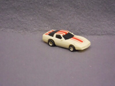 TYCO - CORVETTE with Red Accents - NIGHT GLOW - Motor Tested - Used !