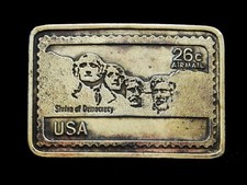 NE01131 VINTAGE 1970s MOUNT RUSHMORE 26 CENT AIRMAIL STAMP ART BELT BUCKLE