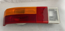 VW Passat B1 Typ 32 Rücklicht + Lampenträger links Hella (y976) NEU NOS