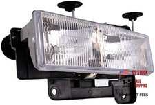 1590000 Headlight Assembly Fits Select Cadillac / Chevrolet / Driver Side