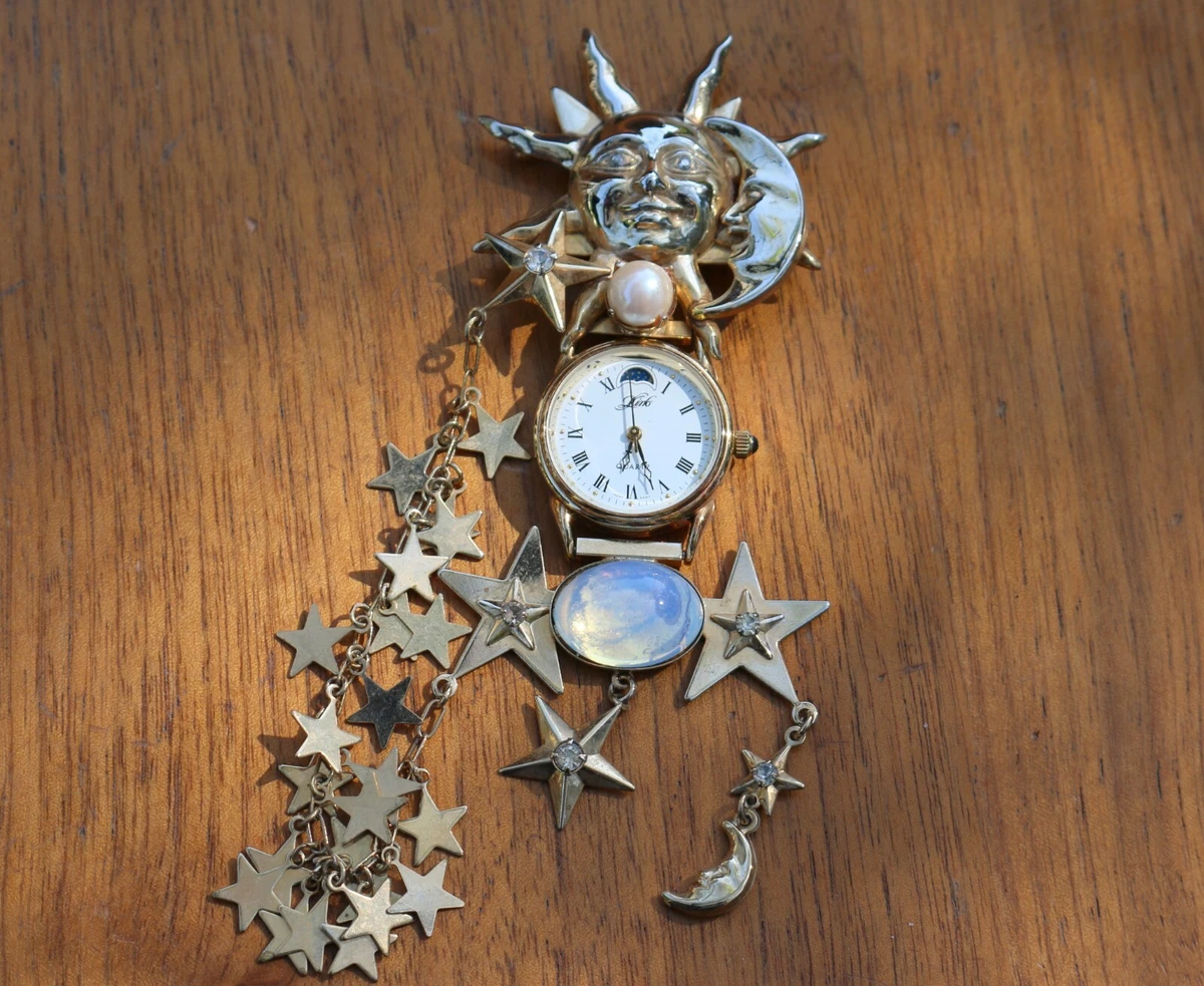 Vintage Kirks Folly Pin Brooch with Watch Sun Moon Face Stars
