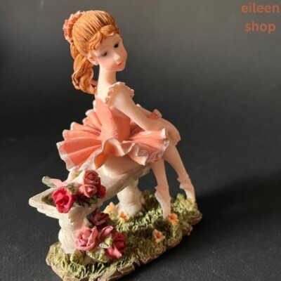 Beautiful Rare Find Ballerina White Tutuon Stone Bench Holding Bundle Of Flowers