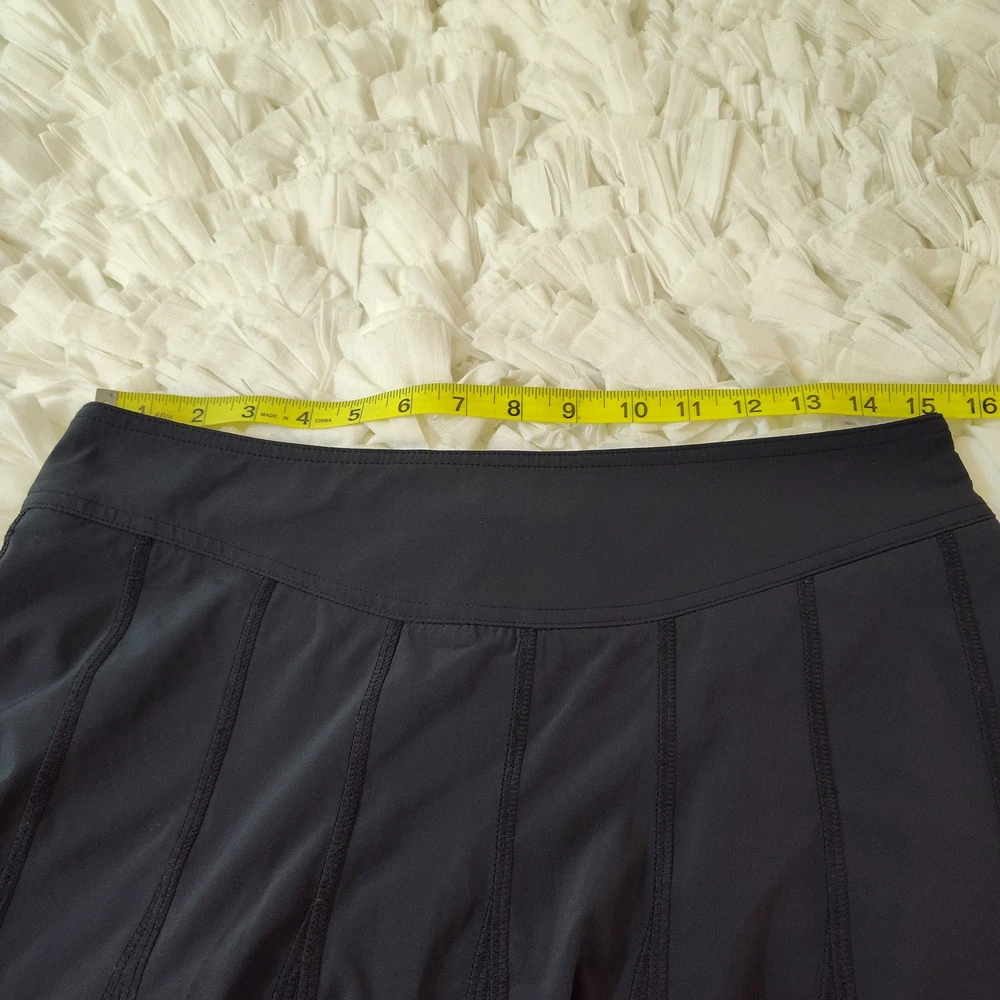 Athleta Womens Athletic Tennis Skirt Size 6 with Built-In Shorts and Zip Pocket