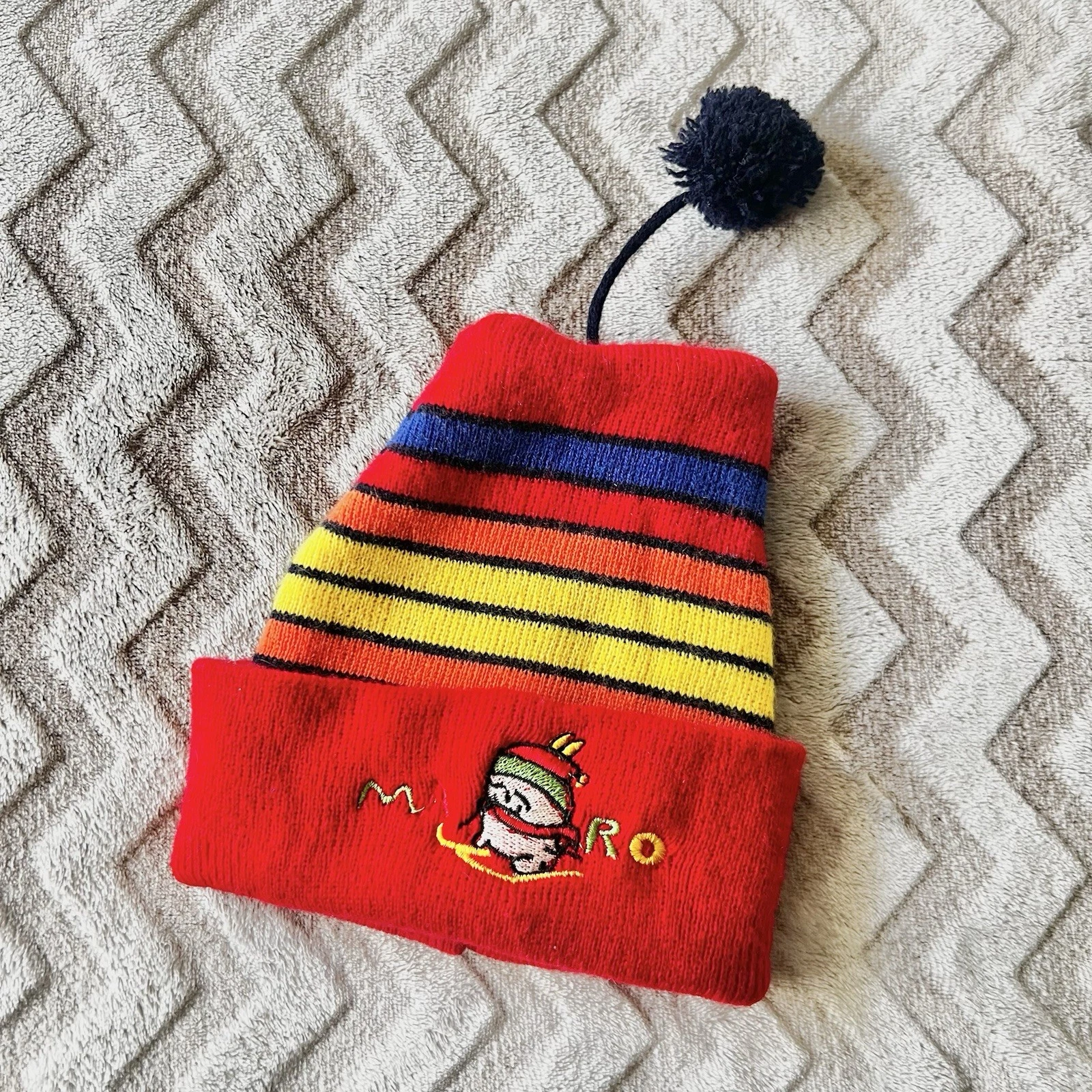 Retro Miro vintage red and yellow striped beanie with embroidered character