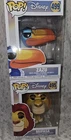 Disney The Lion King Funko Pop! vinyl figures of Zazu (#499) and Mufasa (#495).