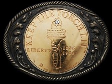 IB25138 VINTAGE 1982  KEEP THE TORCH LIT - LIBERTY CENTENNIAL  BUCKLE