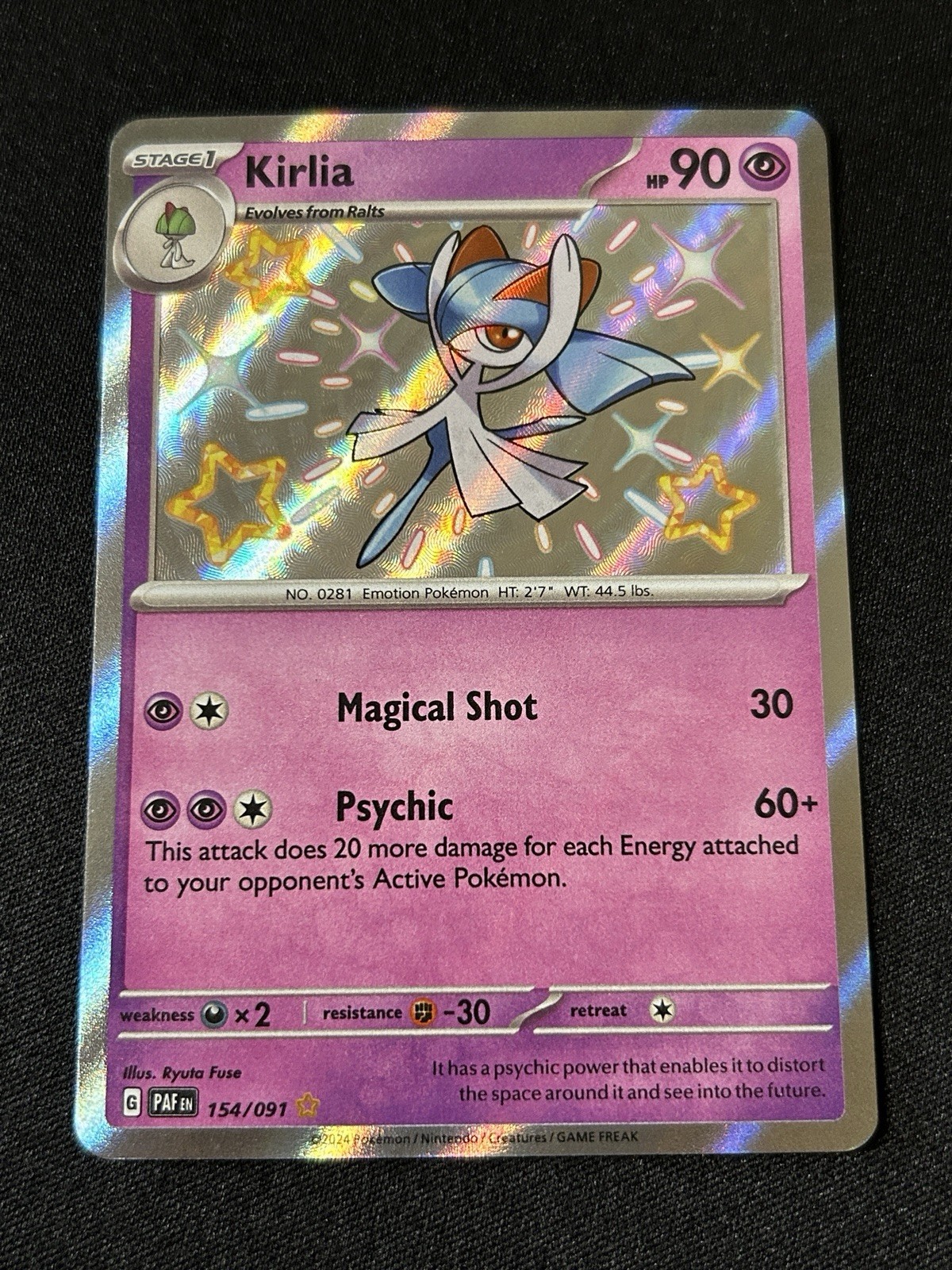 Kirlia 154/091 Shiny Holo Rare Paldean Fates Pokemon Card NM