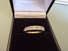 Platinum Wedding Band With Princess Set Diamonds. Size J