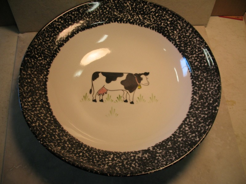 N.S.GUSTIN CO. LARGE BOWL HAND DECORATED WITH COW BACKGROUND.