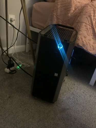 Alienware PC and 2 27’ inch AOC curved monitors.  