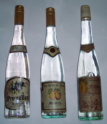 3 verschiedene Eau de Vie Naturelle/de Fruits; je 0,7 l; Obstbrände aus 1970ern
