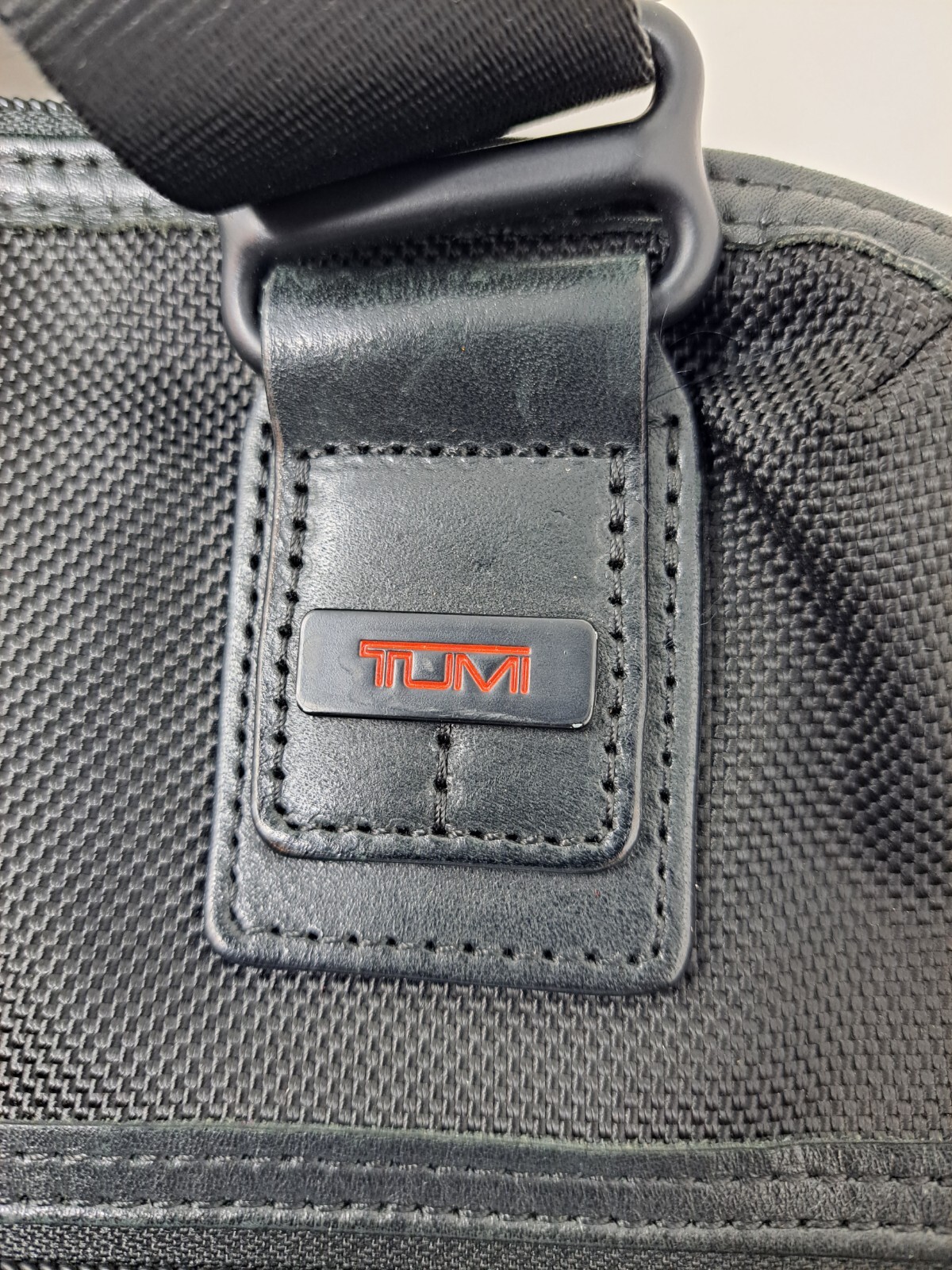 Tumi Canvas and Leather Crossbody Laptop Bag Gem