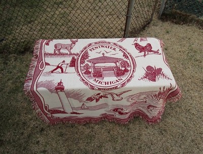 nice Pentwater Michigan blanket bed throw with designs - deer, lighthouse, swan