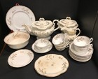Antique (late 1800s) white porcelain tea set with gold botanical design and trim