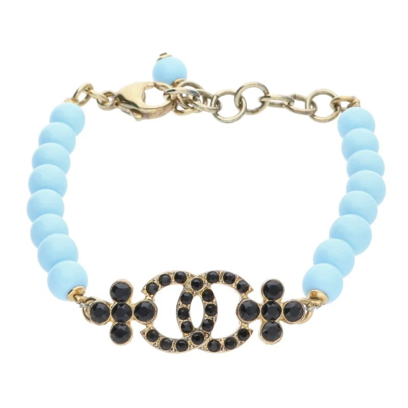 Bracciale Chanel C23A perle marchio cocco strass oro azzurro nero