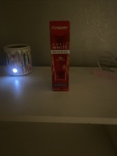 Ultra white Colgate tooth paste makes teeth 1...