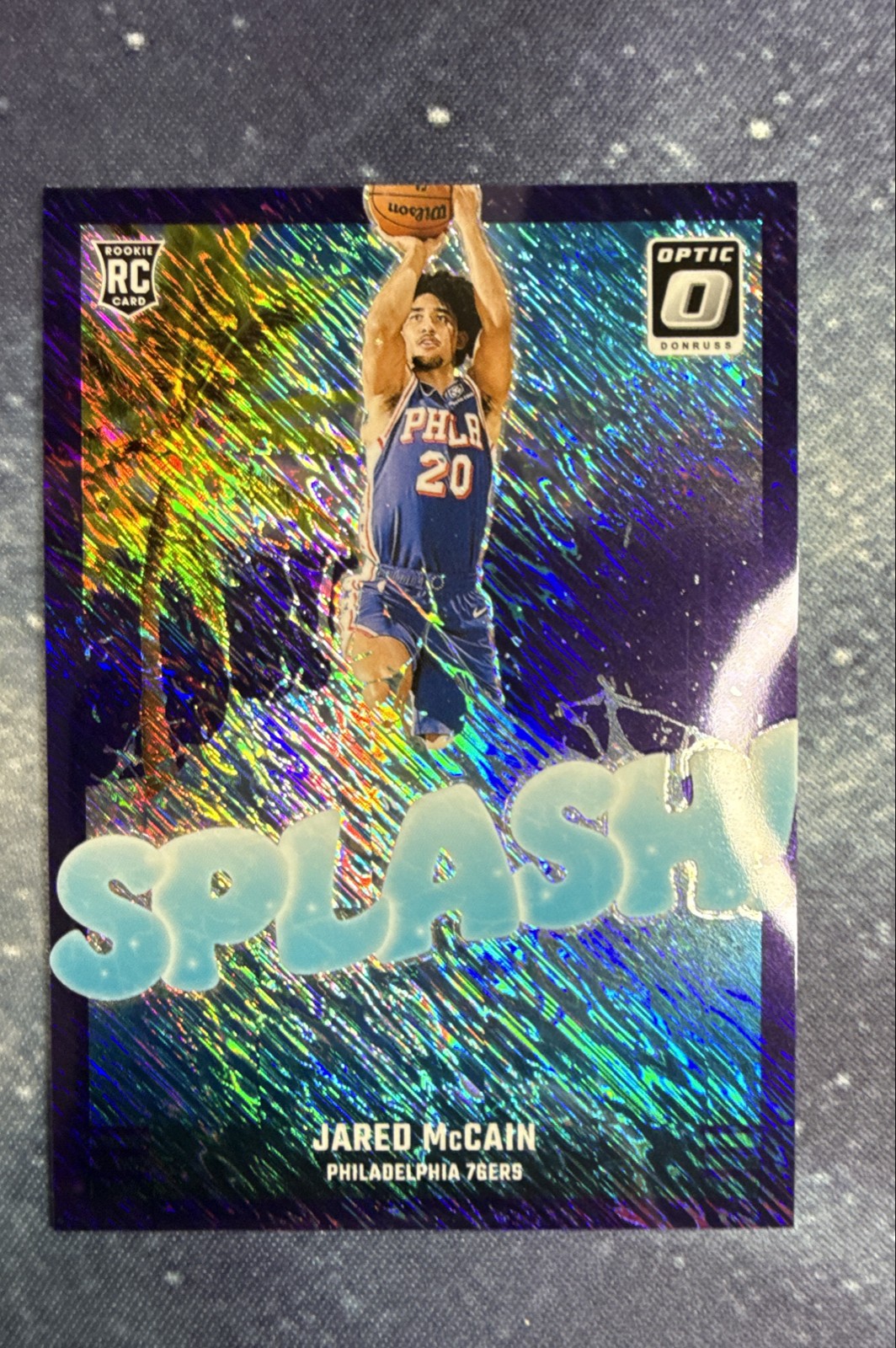 2024-25 Panini Donruss Optic - Splash! Jared McCain #3 Purple Shimmer Prizm (RC)