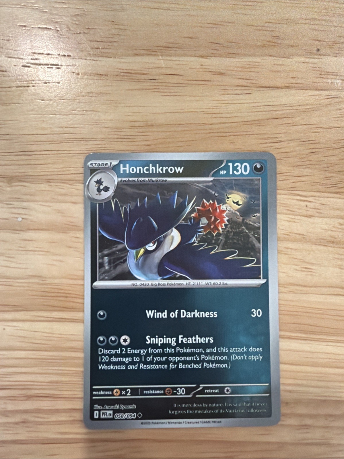 Honchkrow 058/094 Me02: Phantasmal Flames Reverse Holo