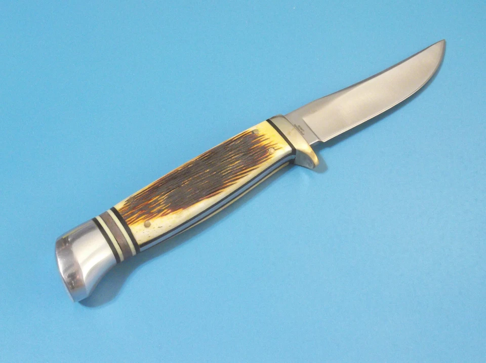 Cuchillo de caza Kissing Crane KC5477 ámbar hueso jigged hoja fija 7 3/4" en general Foto 3 de 4