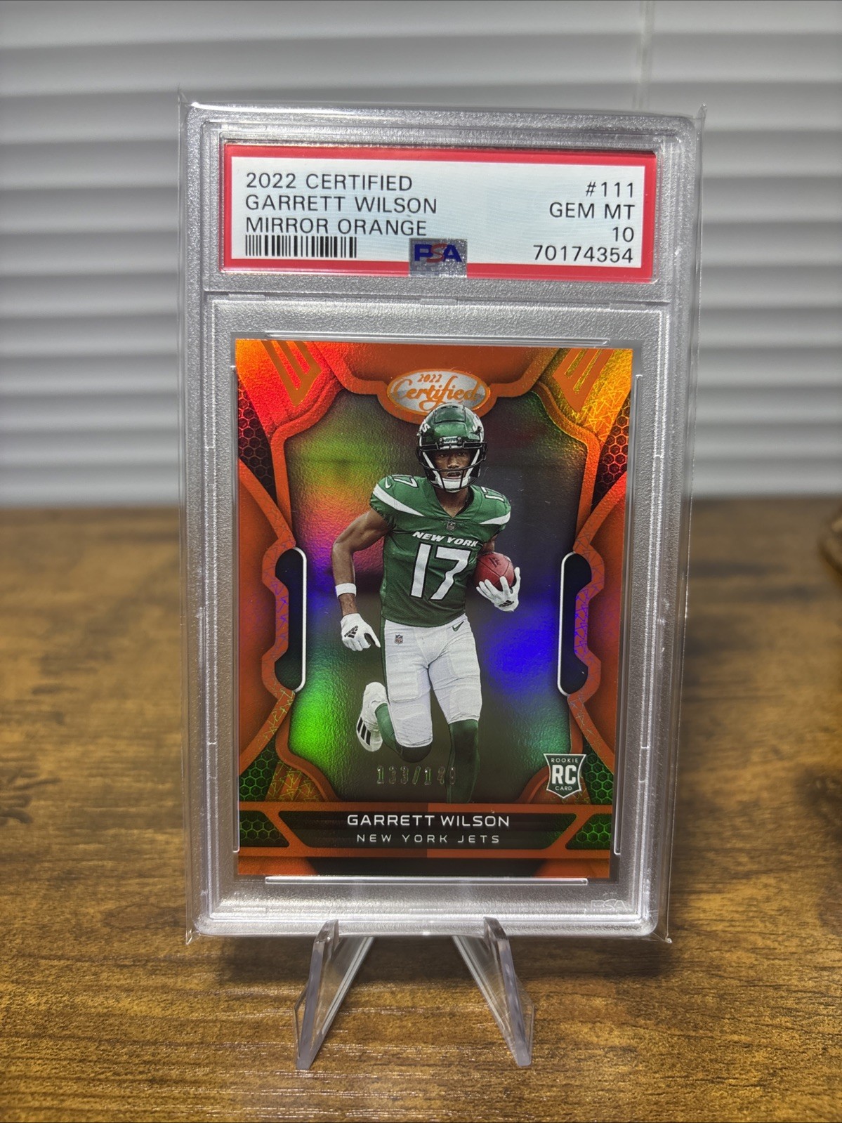 2022 Panini Certified Garrett Wilson #111 Mirror Orange /149 (RC) PSA GEM MT 10