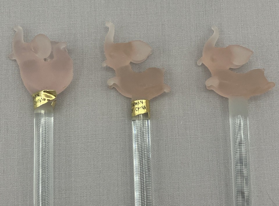 Frosted pink elephant MCM swizzle sticks — a quintessential mid-century cocktail party icon that's instantly recognizable and genuinely stylish.