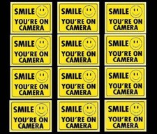 WINDOW SECURITY STICKERS FOR HOME YELLOW SMILE YOURE ON VIDEO CAMERAS ARE IN USE