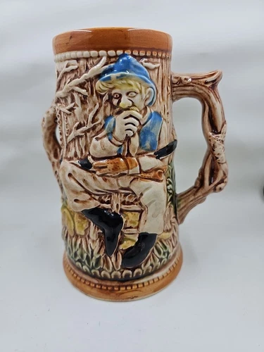 Beer stein old man cabin in woods