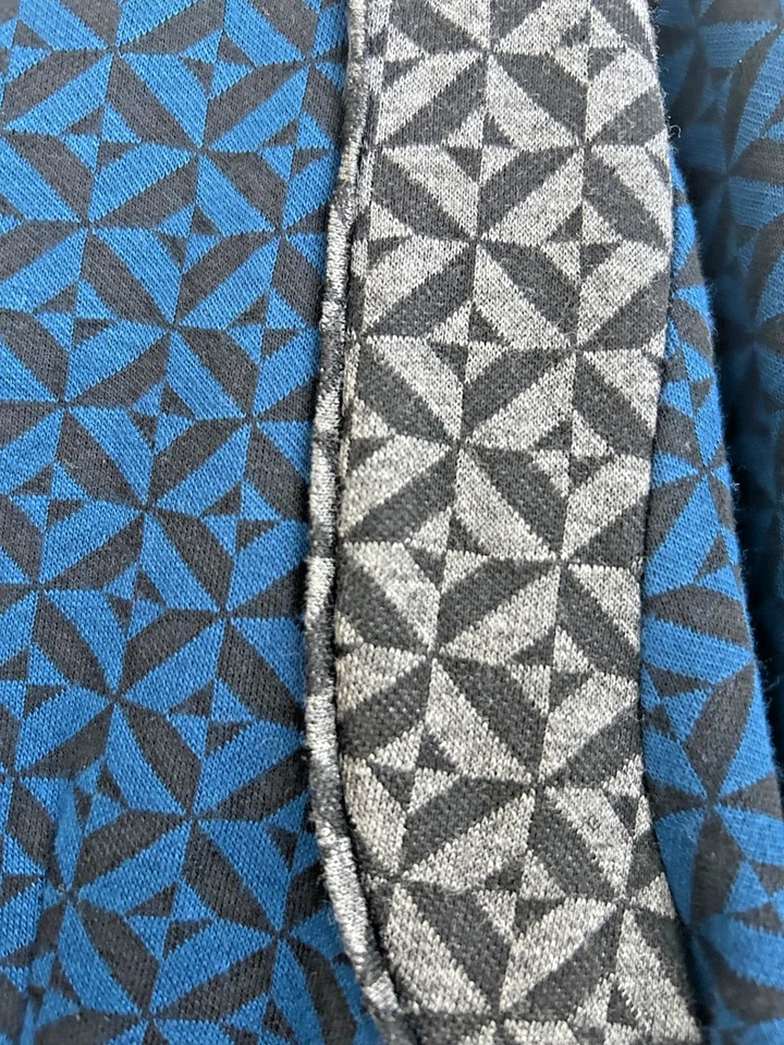 Top geométrico arte para usar peplum geométrico grandes elementos de gracia azul precio de venta sugerido por el fabricante 68 USD Foto 4 de 4