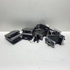 Lot of 4 Assorted Polaroid Instant Cameras-UNTESTED